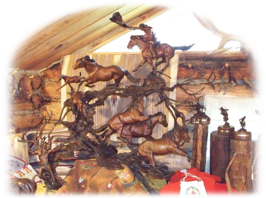 Bronze sculpture of Native Americans capturing horses.