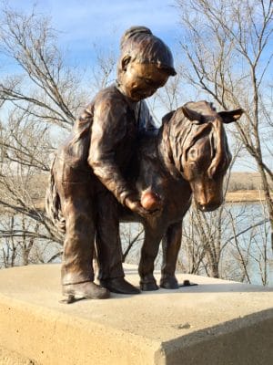 Feedin My Hoss by Pamela Harr Life-size on the Towne St. Bridge, Glendive