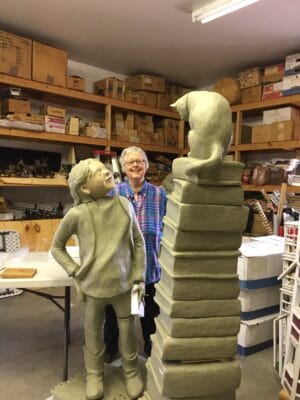 Pamela Harr, artist, admires her work.